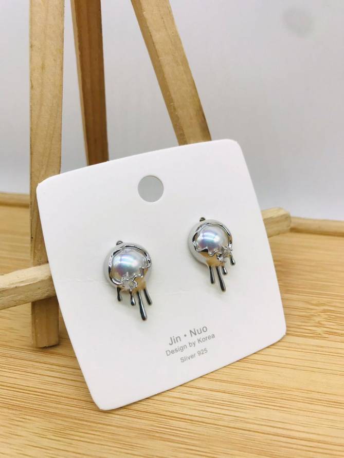 AD Diamond Steel And Rose Gold Party Wear Earrings 42
